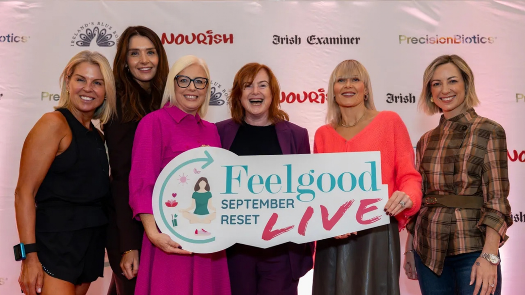 Six women holding a Feelgood September Reset Live sign at the Irish Examiner event in Cork