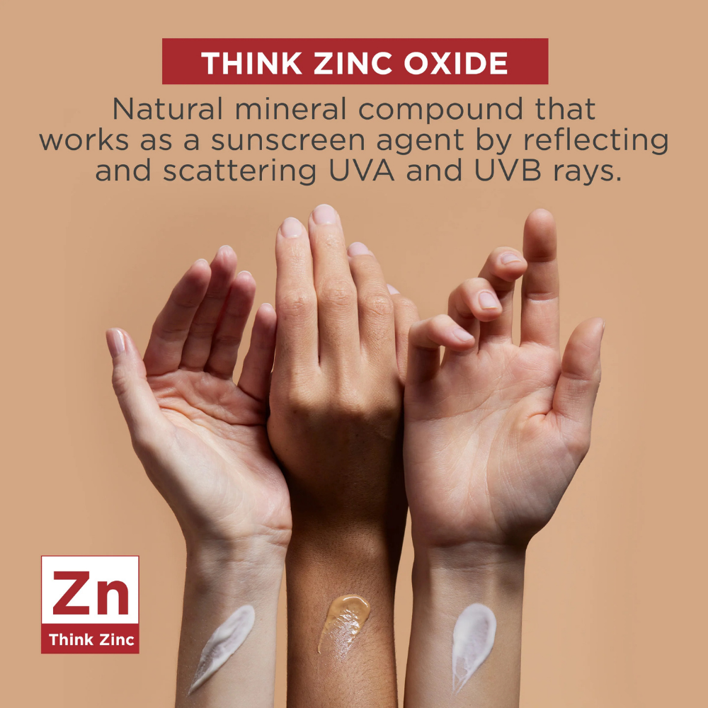 Three hands with different skin tones holding a brown background, featuring text about zinc oxide and a 'Think Zinc' logo.