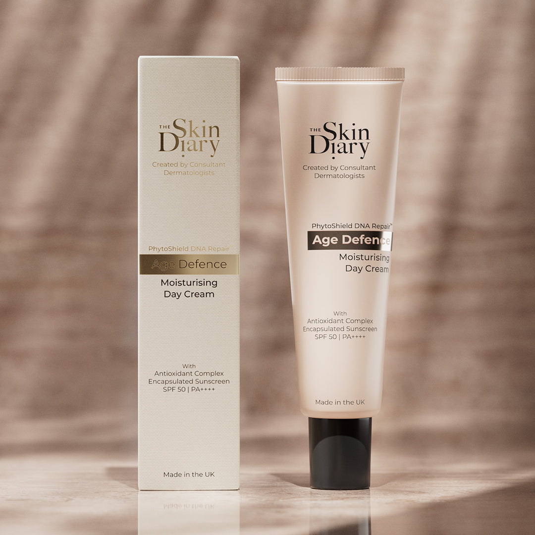 The Skin Diary Age Defend Moisturising Day Cream with packaging on a brown background