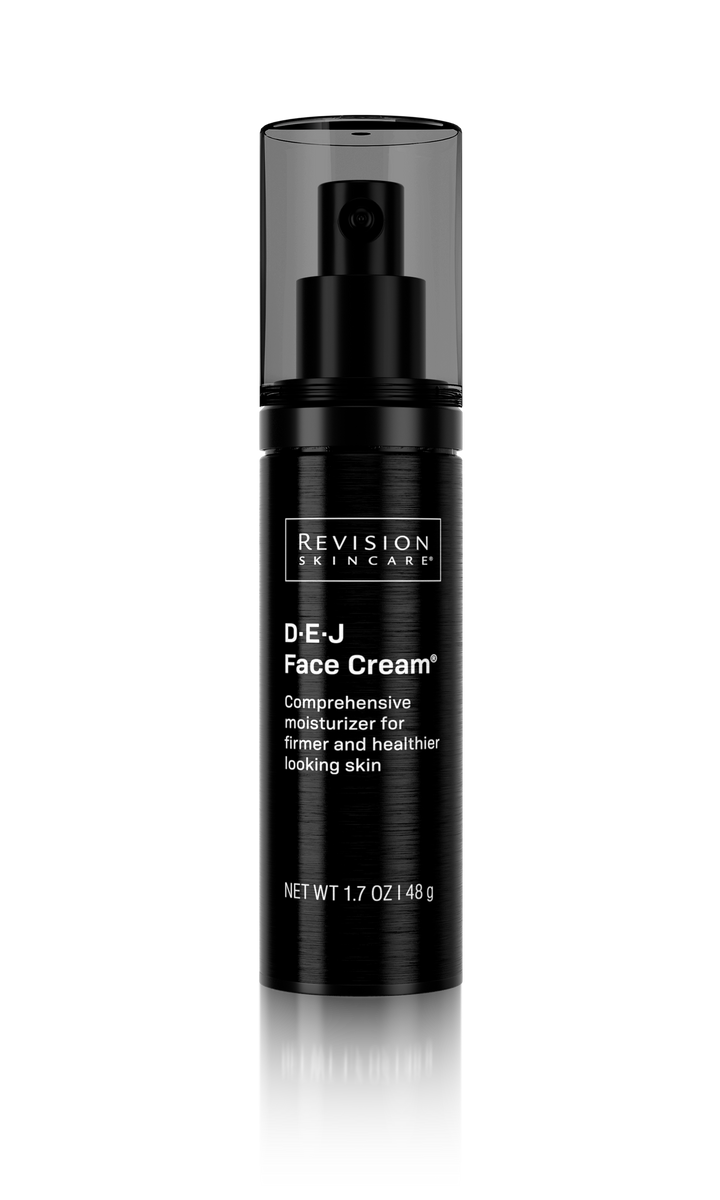 Black face cream bottle with 'Revision Skincare' label on a white background