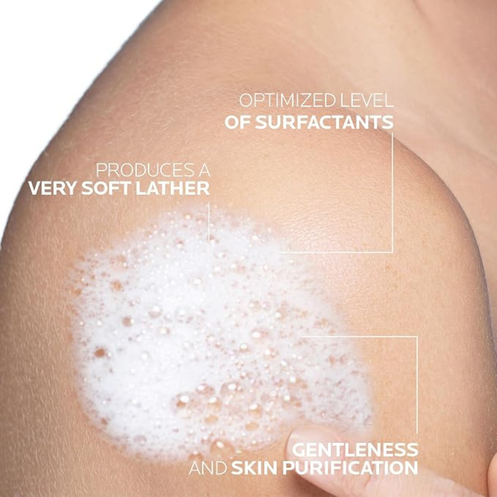 Close-up of a person's shoulder with soap lather and text about surfactants and skin care.