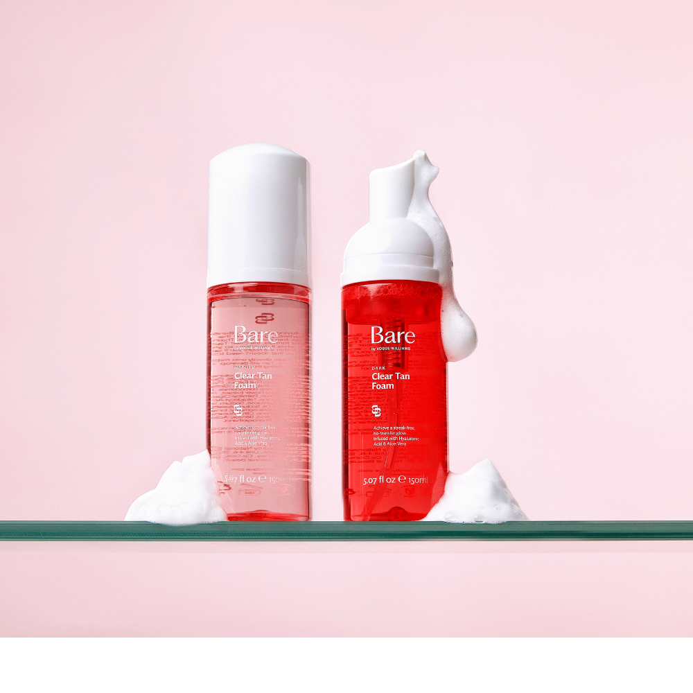 Bare by Vogue clear tan foam bottles with white pumps, red labels, and visible white foam