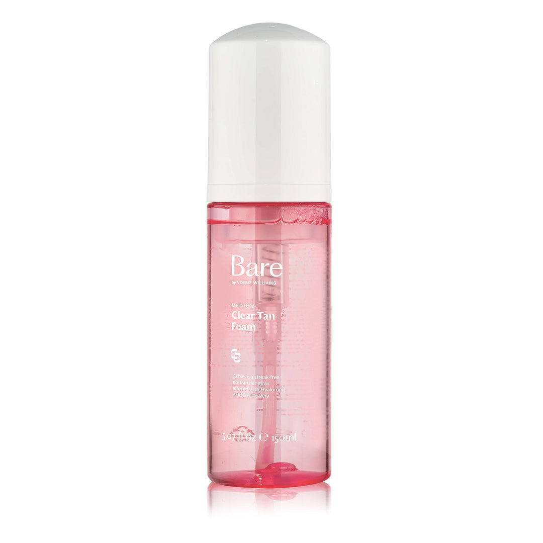 Bare by Vogue clear tan foam in a transparent pink bottle with a white cap and pump dispenser