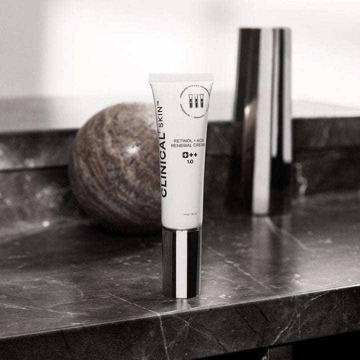 Clinical Skin Retinol cream in a white tube with black and silver cap, labelled Retinol + AOX Renewal Cream