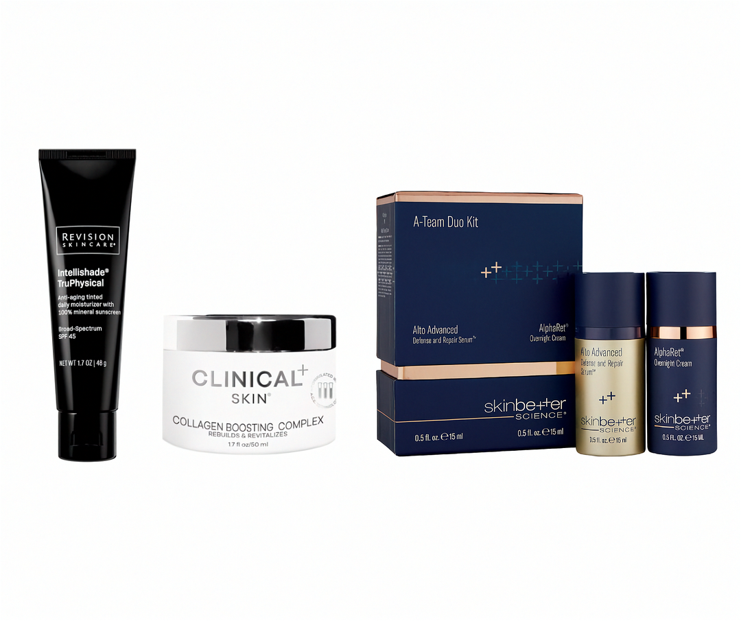 Collection of skincare products including bottles and a box on a white background