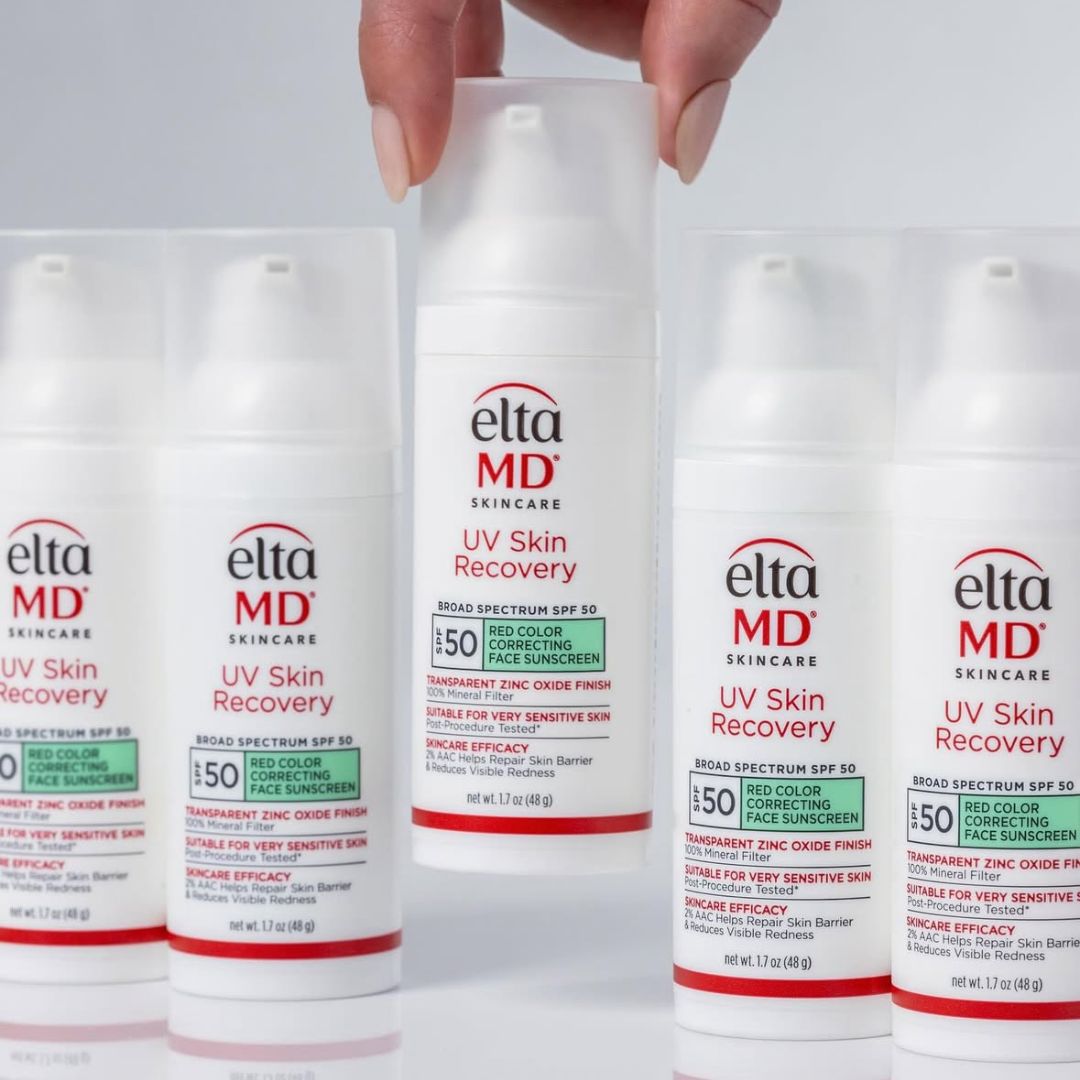 EltaMD UV Skin Recovery SPF 50 white mineral sunscreen bottles with red labels and green-tinted colour correcting formula