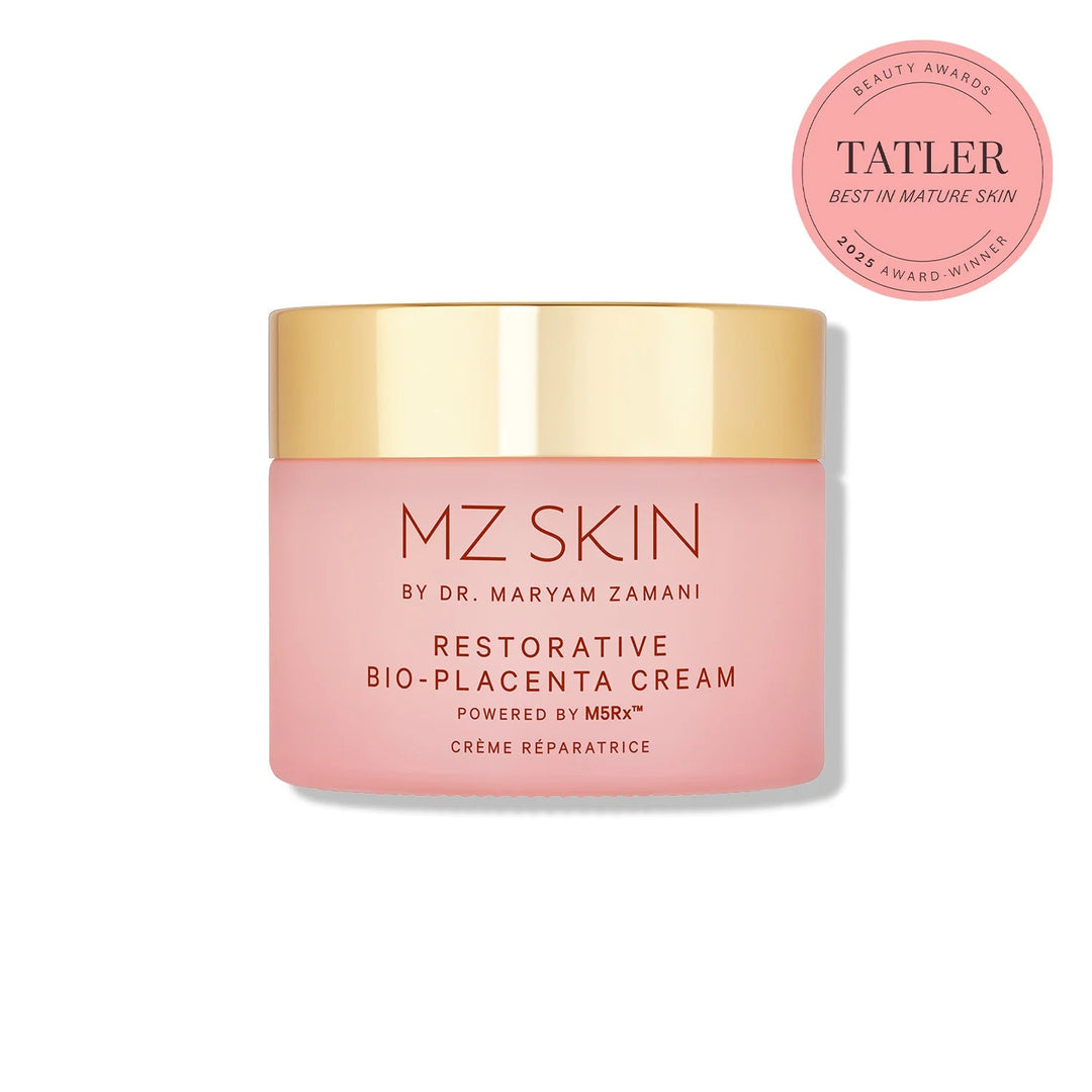 MZ Skin Restorative Bio-Placenta Cream in a pink jar with a reflective gold lid and award badge