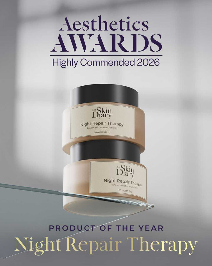 Night Repair Therapy cream jars in black and cream packaging with Product of the Year award branding