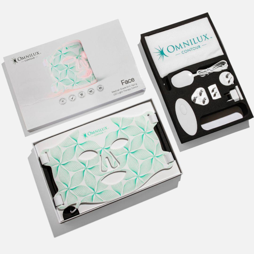 Omnilux Contour Face LED mask with white and mint geometric pattern, controller, power supply, and accessories