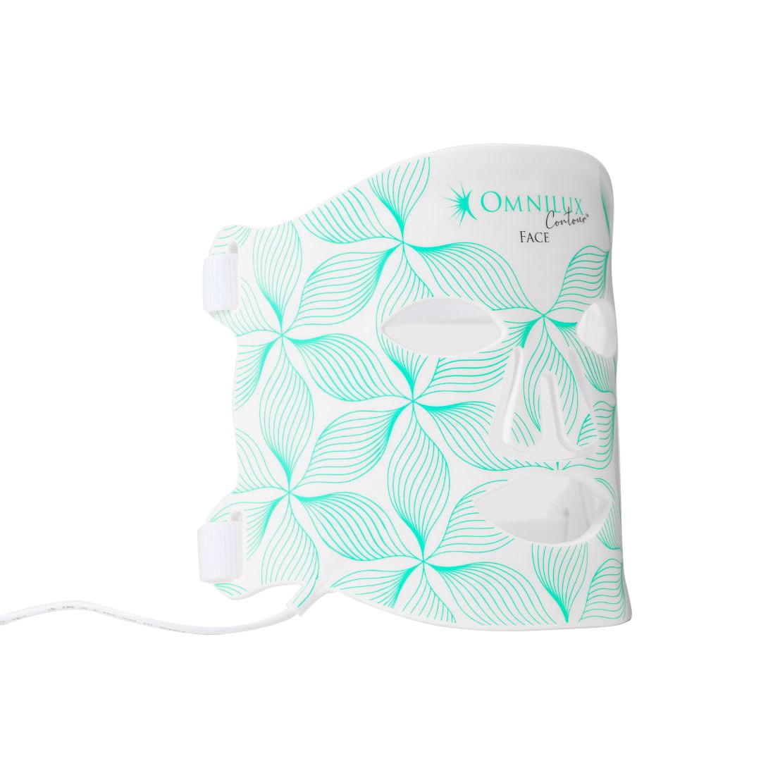 Omnilux Contour Face LED mask in white with turquoise floral line pattern and flexible eye and mouth openings