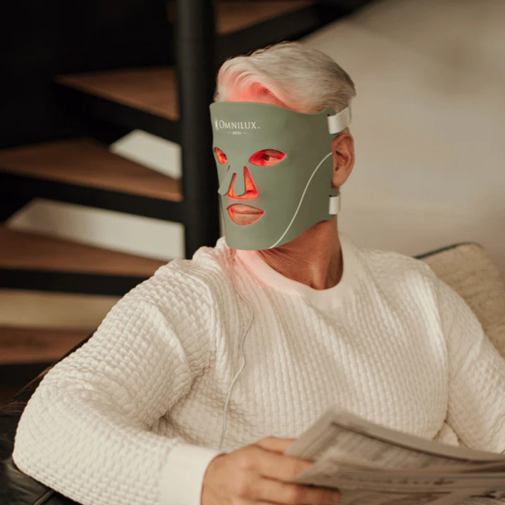 Omnilux Men LED Mask flexible green silicone face mask with red LED lights and adjustable white straps