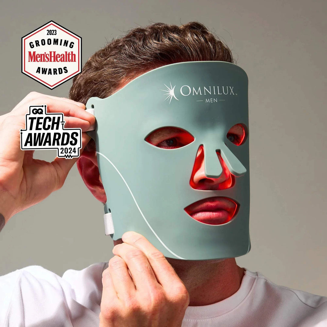 Omnilux Men LED Mask in sage green silicone with facial cutouts and adjustable white straps