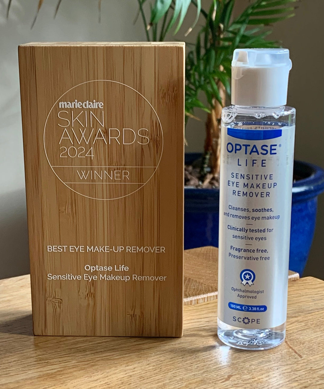 Optase Life Sensitive Eye Makeup Remover clear 100ml bottle with white pump and award-winning wooden box