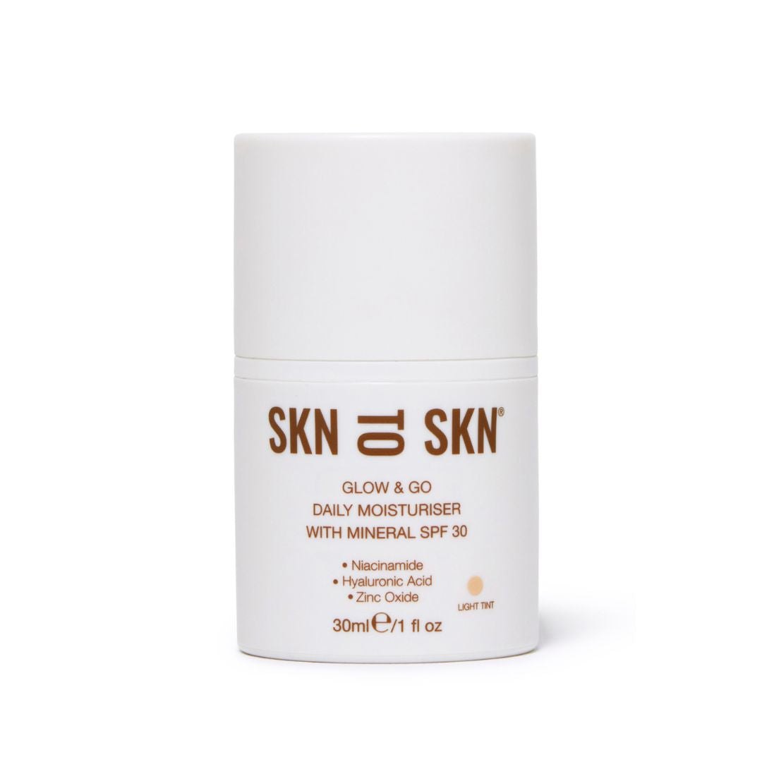 Pregnancy Bundle daily moisturiser in a white cylindrical bottle with mineral SPF 30 and Light tint