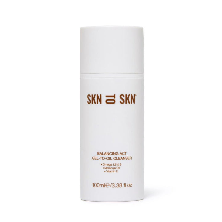 Pregnancy Bundle white Balancing Act gel-to-oil cleanser bottle with minimalist SKN to SKN branding