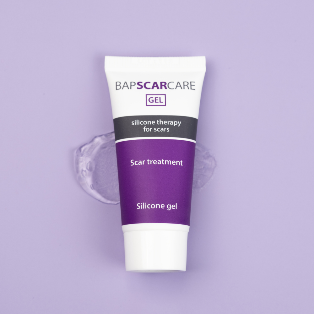Silicone gel for scars in a white and purple 20g tube, with clear gel visible around the package