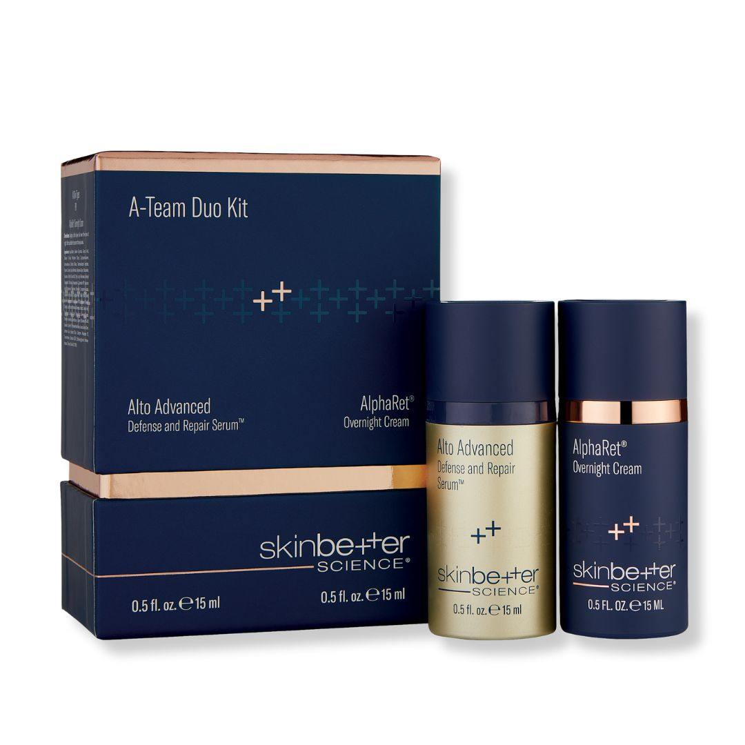 Skinbetter Science A-Team Duo Kit with navy boxes and two gold skincare serum and overnight cream bottles