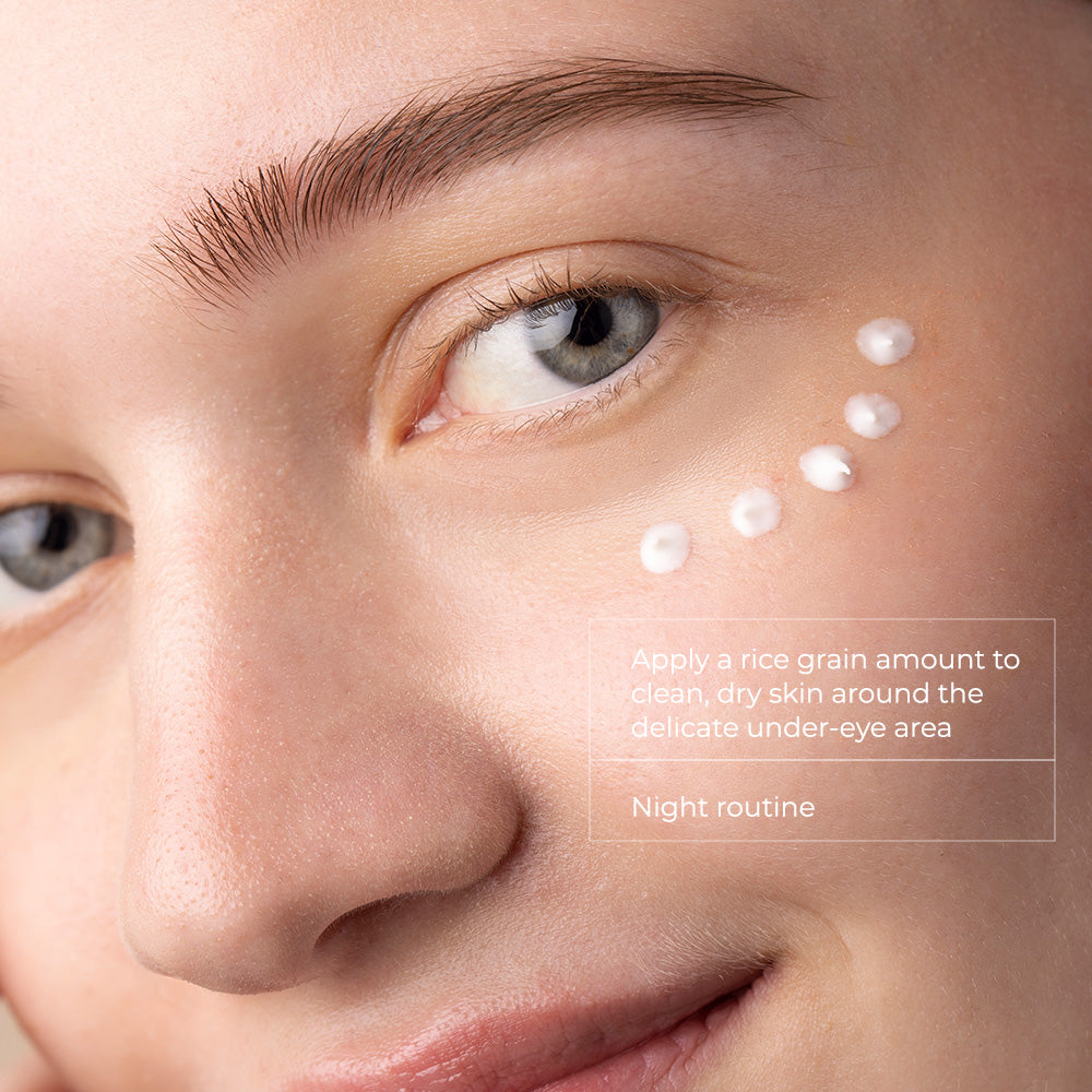 Skinbetter Science eye cream shown as white dots applied beneath the eye for a nightly under-eye skincare routine