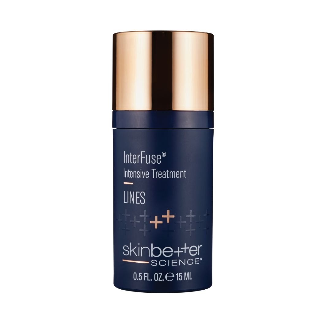 Skinbetter Science InterFuse intensive treatment lines in a navy blue bottle with a rose gold metallic cap