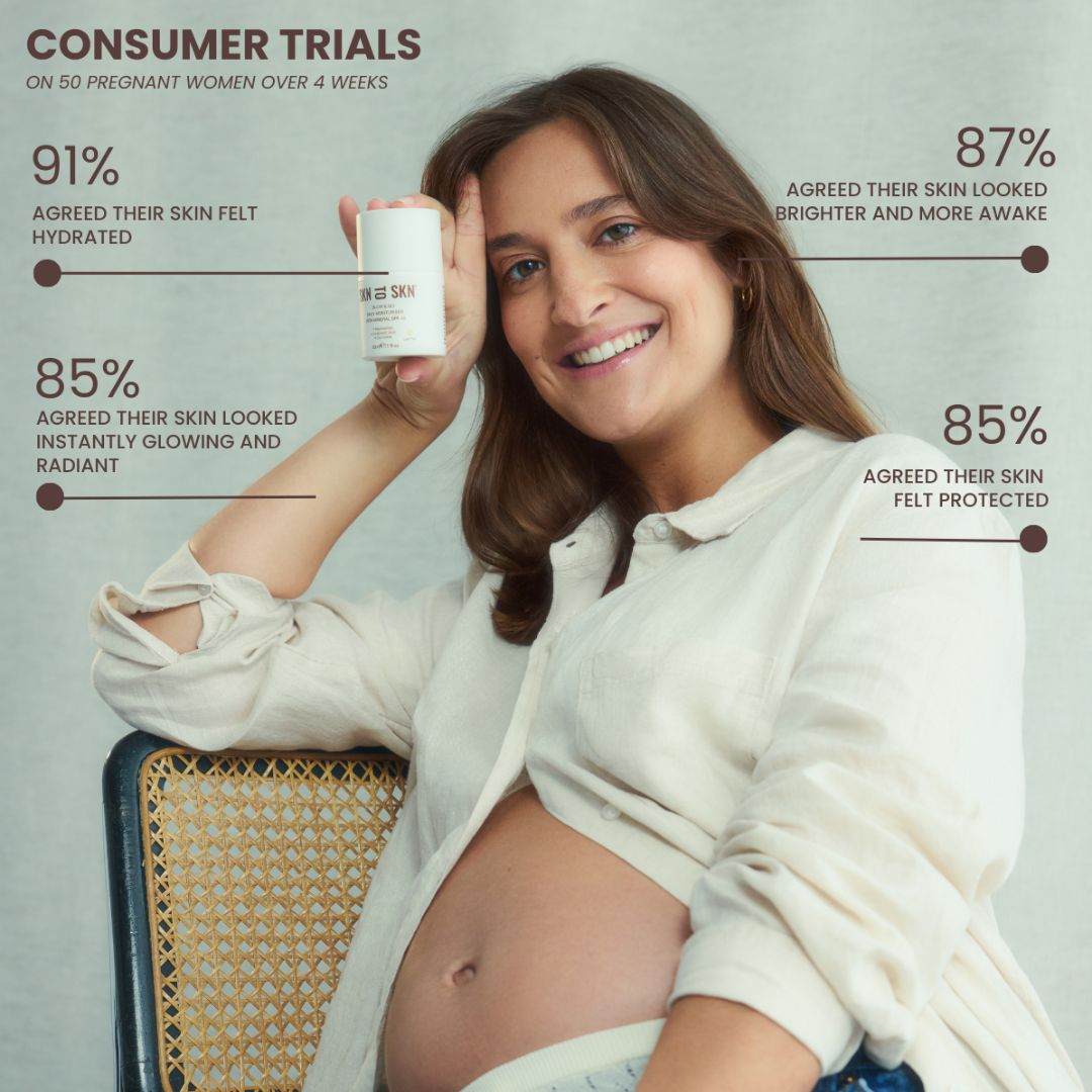Skn to Skn Glow & Go tinted moisturiser in a white pump bottle held by a pregnant woman
