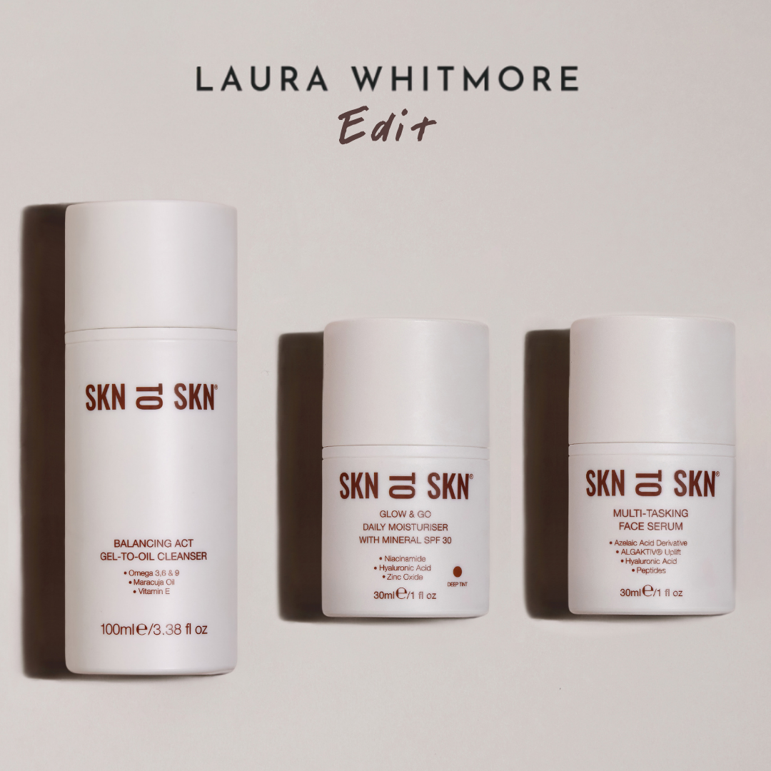 Skn to Skn Laura Whitmore skincare set with white minimalist bottles featuring balancing act gel-to-oil cleanser, face serum, and daily moisturizer with SPF 30