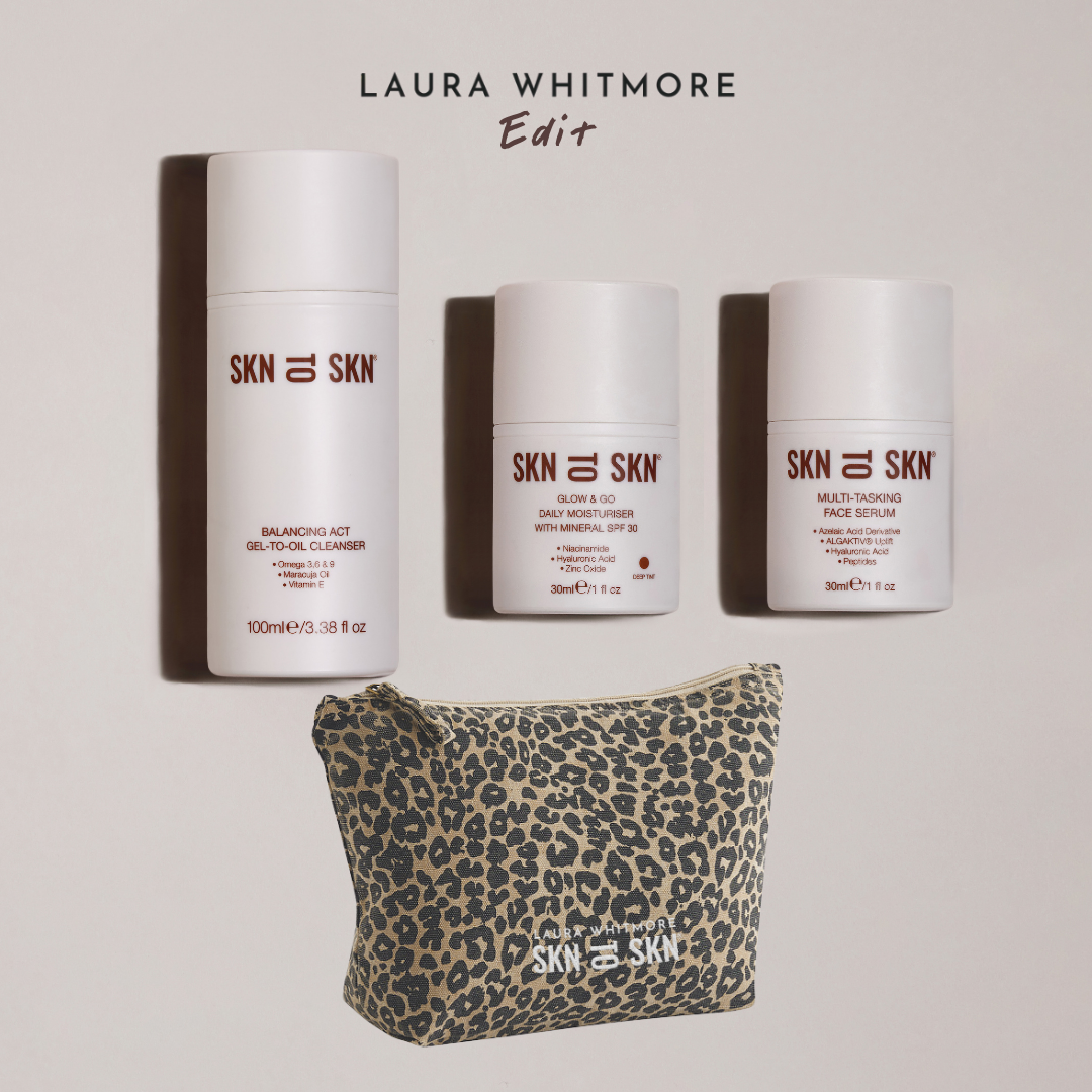 Skn to Skn Laura Whitmore skincare gift set with white bottles of cleanser, moisturizer with SPF 30, serum, and leopard print pouch