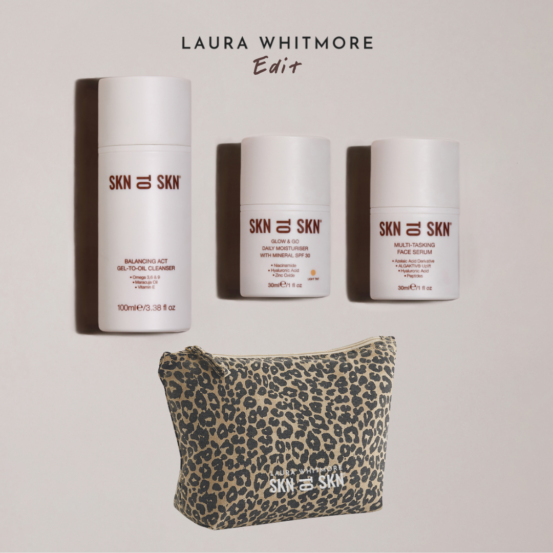 Skn to Skn Laura Whitmore skincare set with white bottles of cleanser, face serum, daily moisturiser with SPF, and leopard print pouch