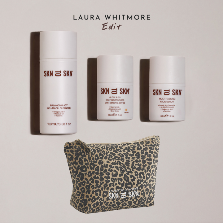 Skn to Skn Laura Whitmore skincare set with white bottles of cleanser, face serum, daily moisturiser with SPF, and leopard print pouch