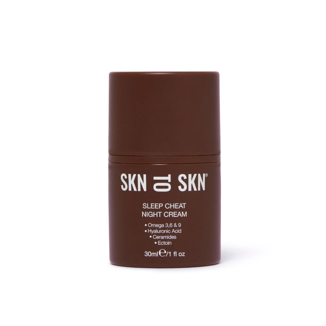 Skn to Skn Sleep Cheat Night Cream in a dark brown cylindrical pump bottle with white text