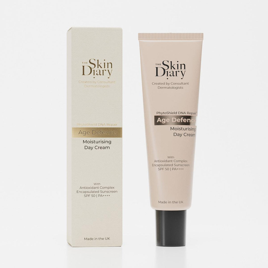 The Skin Diary Age Defence moisturising day cream in a beige tube with matching box, SPF 50 skincare