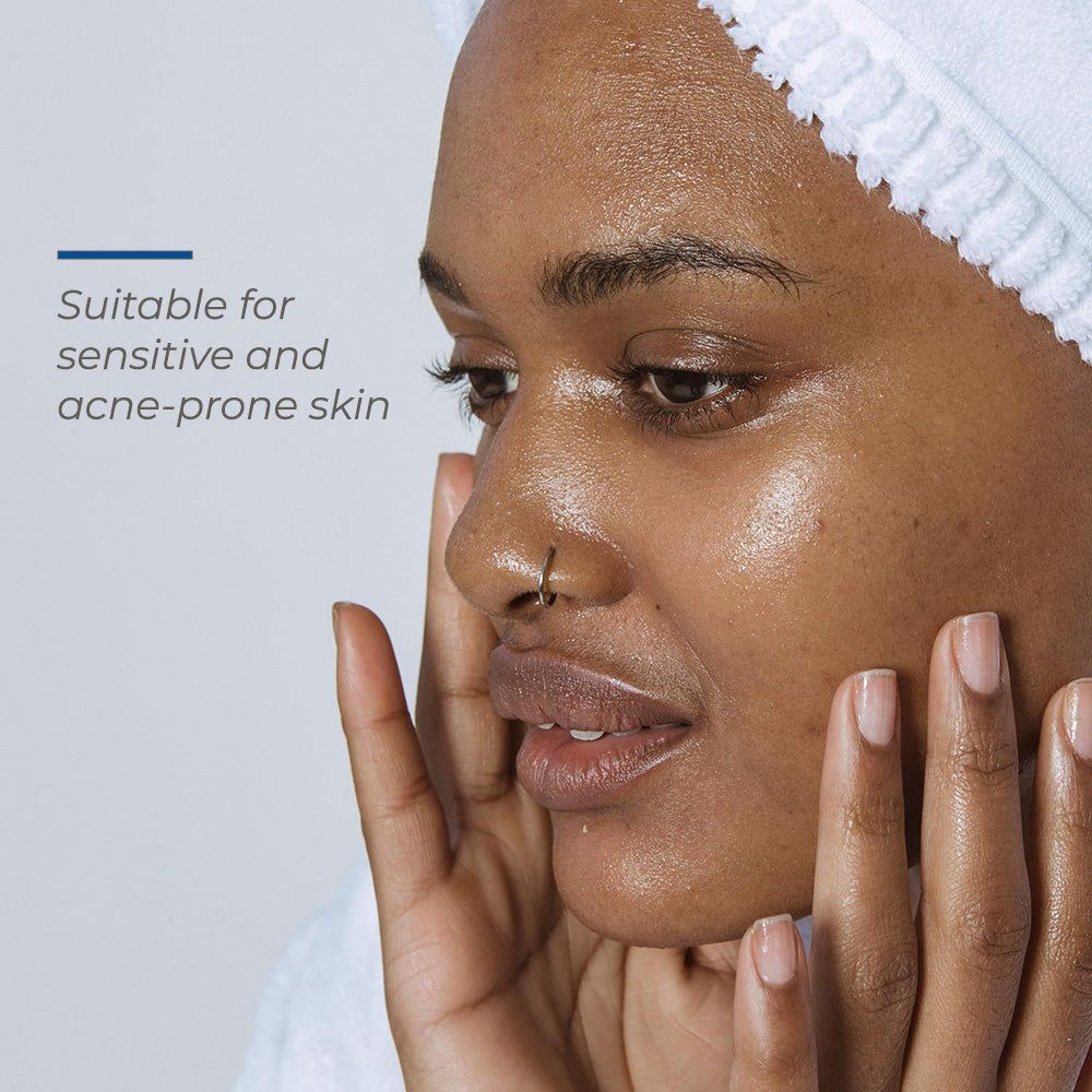 Toner for sensitive and acne-prone skin, shown on a woman with hydrated, dewy skin and a white headband