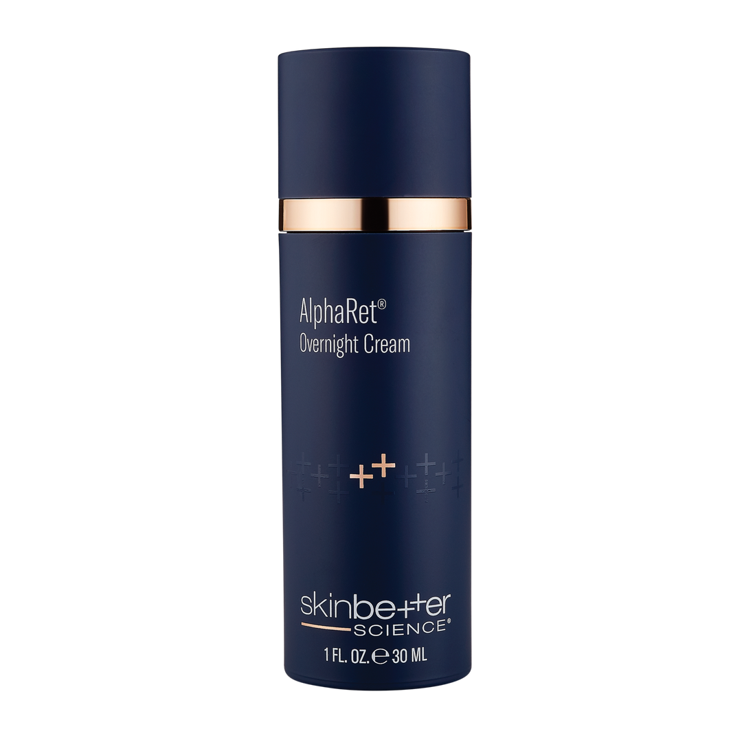 Skinbetter Science AlphaRet Overnight Cream in a sleek navy blue bottle with gold accents and white text branding