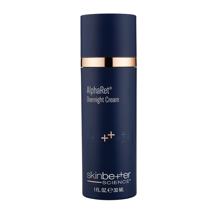 Skinbetter Science AlphaRet Overnight Cream in a sleek navy blue bottle with gold accents and white text branding