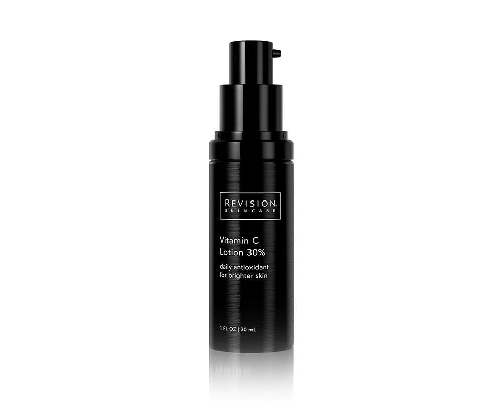 Vitamin C Lotion 30% in a sleek black pump bottle with white text for daily antioxidant skincare use